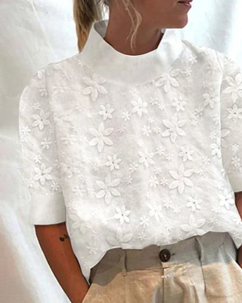 Blouse with embroidered solid standing collar